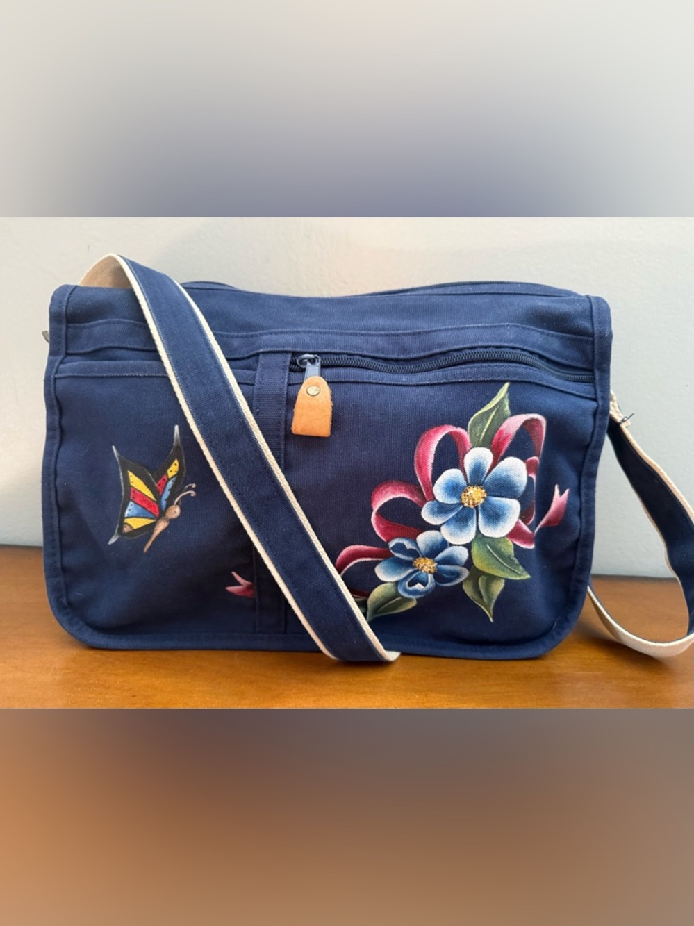 Amanda Smith Navy Crossbody Bag with Hand-Painted Floral and Butterfly